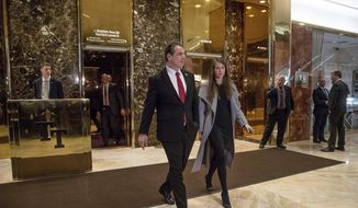 New York Gov. Andrew Cuomo, left, accompanied by his top aide, Melissa DeRosa, walks to talk with members of the media after meeting with President-elect Donald Trump at Trump Tower in New York, Wednesday, Jan. 18, 2017. DeRosa resigned Sunday, Aug. 8, 2021, a week after a report found the governor sexually harassed 11 women. (AP Photo/Andrew Harnik, File)