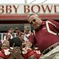 In this Aug. 12, 2007, file photo, Florida State head football coach Bobby Bowden, right, squeezes into his seat for a team photo during media day activities in Tallahassee, Fla. The Hall of Fame college football coach Bobby Bowden has died after a battle with pancreatic cancer. Exuding charm and wit, Bowden led Florida State to two national championships and a record of 315-98-4 during his 34 seasons with the Seminoles. In all, Bowden had 377 wins during his 40 years in major college coaching. He was 91 years old. (AP Photo/Phil Coale, File) **FILE**