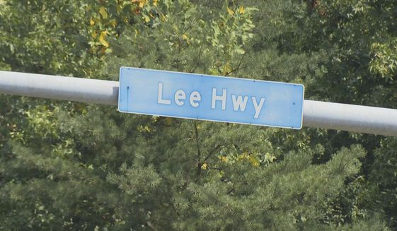 This Monday, July 26, 2021 photo shows a sign for Lee Highway in Fairfax County, Va. The names of Confederate leaders are being stripped from schools and major highways throughout Virginia. But when it comes to the many side streets in the state that carry Confederate names, it&#39;s a different story. (AP Photo/Dan Huff)