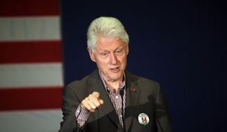 In this photo taken May 5, 2016, former President Bill Clint speaks in Portland, Ore. while campaigning for his wife, Democratic presidential candidate Hillary Clinton.  Newly released records show the scandal-plagued former president had withdrawn his approval for a teaching chair to be named after himself at the University of Arkansas&#39;s William H. Bowen School of Law. Yet emeritus professor John DiPippa, who has held the post since it was first endowed in 2000, recently dubbed it the Clinton chair anyway. (AP Photo/Don Ryan)  **FILE**