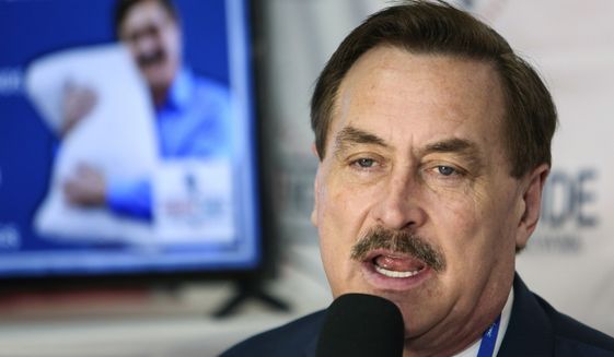 MyPillow founder and CEO Mike Lindell gives an interview with Right Side Broadcasting Network at the Conservative Political Action Conference in Orlando, Fla., on Feb. 28, 2021. A federal judge cleared the way Wednesday, Aug. 11 for a defamation case by Dominion Voting Systems to proceed against Trump allies Lindell, Sidney Powell and Rudy Giuliani, who had all falsely accused the company of rigging the 2020 presidential election. U.S. District Judge Carl Nichols handed down a ruling Wednesday that found there was no blanket protection on political speech. (Sam Thomas/Orlando Sentinel via AP) **FILE**