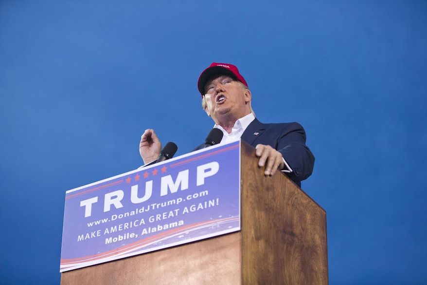 Donald Trump speaks to a crowd of 30,000 during a massive rally in Mobile, Alabama on Aug. 21. 2015. (AP Photo) **FILE**