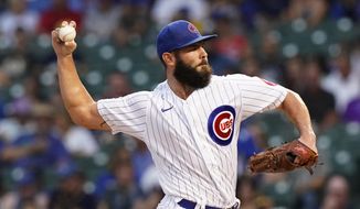Chicago Cubs starting pitcher Jake Arrieta throws to a Milwaukee Brewers batter during the first inning of a baseball game in Chicago, Wednesday, Aug. 11, 2021. (AP Photo/Nam Y. Huh) **FILE**