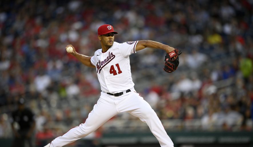 Washington Nationals starting pitcher Joe Ross delivers a pitch during a baseball game against the Chicago Cubs, Saturday, July 31, 2021, in Washington. (AP Photo/Nick Wass) **FILE**