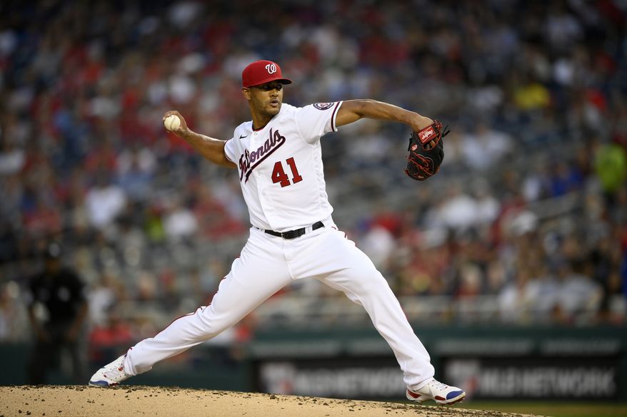 Washington Nationals starting pitcher Joe Ross delivers a pitch during a baseball game against the Chicago Cubs, Saturday, July 31, 2021, in Washington. (AP Photo/Nick Wass) **FILE**