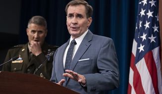 Pentagon spokesman John Kirby, right, speaks accompanied by U.S. Army Major Gen. William Taylor, Joint Staff Operations, during a media briefing at the Pentagon, Tuesday, Aug. 17, 2021, in Washington. (AP Photo/Alex Brandon)