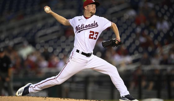 Washington Nationals starting pitcher Erick Fedde (23) delivers during the third inning of a baseball game against the Toronto Blue Jays, Tuesday, Aug. 17, 2021, in Washington. (AP Photo/Nick Wass)