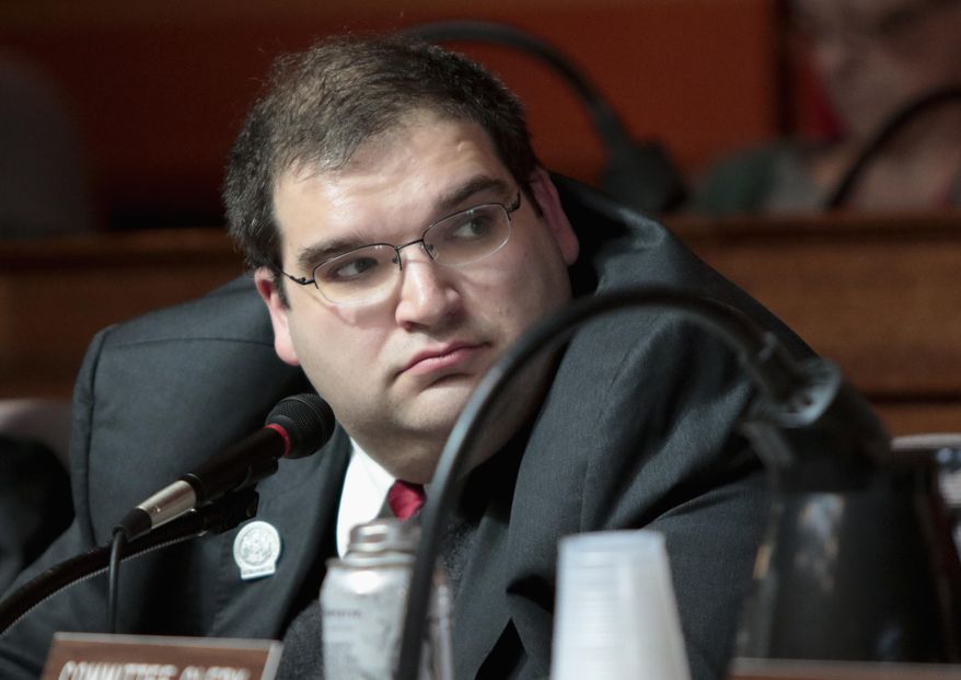 FILE - In this March 2, 2015, file photo shows Wisconsin Republican state Rep. Andre Jacques at a labor committee hearing at the State Capitol in Madison, Wis. Jacques, one of the Legislature's most conservative lawmakers and a vocal opponent of mask and vaccine mandates, tested positive for COVID-19 last week and was at the hospital on Monday, Aug. 16, 2021 with pneumonia. (Michael P. King/Wisconsin State Journal via AP, File)