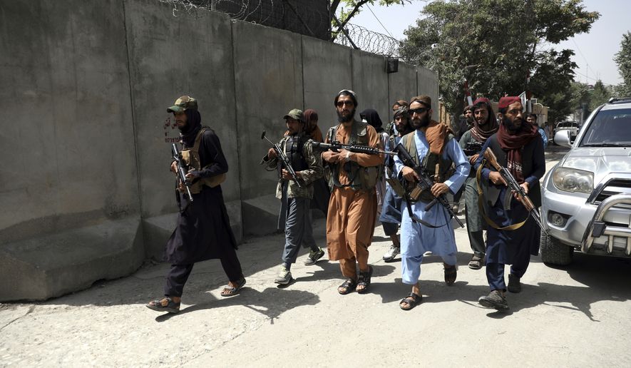 Taliban fighters patrol in Wazir Akbar Khan neighborhood in the city of Kabul, Afghanistan, Wednesday, Aug. 18, 2021. The Taliban declared an &quot;amnesty&quot; across Afghanistan and urged women to join their government Tuesday, seeking to convince a wary population that they have changed a day after deadly chaos gripped the main airport as desperate crowds tried to flee the country. (AP Photo/Rahmat Gul)