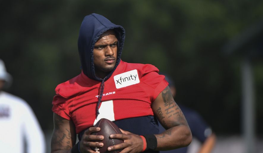 In an Aug. 2, 2021 file photo, Texans quarterback Deshaun Watson practices with the team during NFL football practice in Houston. Attorneys involved in the lawsuits accusing Watson of sexual assault and harassment say the FBI has become involved in the case. Tony Buzbee, the attorney for the 22 women who have sued Watson, said Wednesday, Aug. 18, 2021 he and some of his clients have spoken with FBI agents about the allegations against Watson.(AP Photo/Justin Rex_file) **FILE**