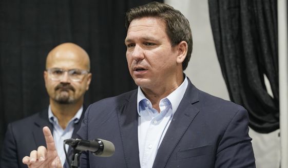 Florida Gov. Ron DeSantis speaks at the opening of a monoclonal antibody site Wednesday, Aug. 18, 2021, in Pembroke Pines, Fla. The site at C. B. Smith Park will offer monoclonal antibody treatment sold by Regeneron to people who have tested positive for COVID-19. (AP Photo/Marta Lavandier)