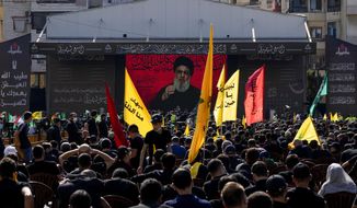 Hezbollah supporters listen to their leader Sayyed Hassan Nasrallah as he speaks via a video link during Ashoura, the Shiite Muslim commemoration marking the death of Immam Hussein, the grandson of the Prophet Muhammad, at the Battle of Karbala in present-day Iraq in the 7th century, in southern Beirut, Lebanon, Thursday, Aug. 19, 2021. Nasrallah said Thursday that the first Iranian fuel tanker will sail toward Lebanon &amp;quot;within hours&amp;quot; warning Israel and the United States not to intercept it. (AP Photo/ Hassan Ammar)