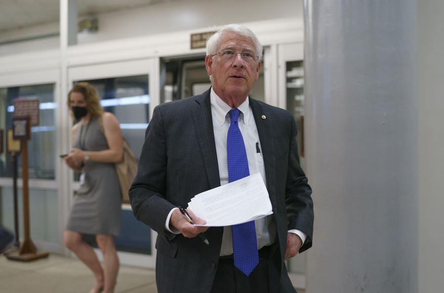In this Thursday, May 27, 2021 file photo, Sen. Roger Wicker, R-Miss., arrives as senators go to the chamber for votes ahead of the approaching Memorial Day recess, at the Capitol in Washington. (AP Photo/J. Scott Applewhite) **FILE**