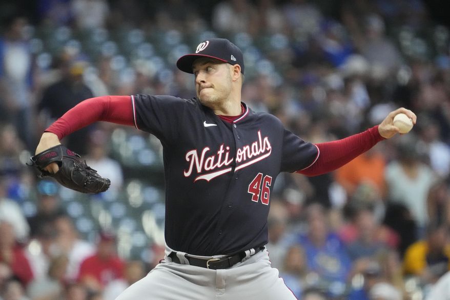 Washington Nationals starting pitcher Patrick Corbin throws during the first inning of a baseball game against the Milwaukee Brewers Friday, Aug. 20, 2021, in Milwaukee. (AP Photo/Morry Gash)