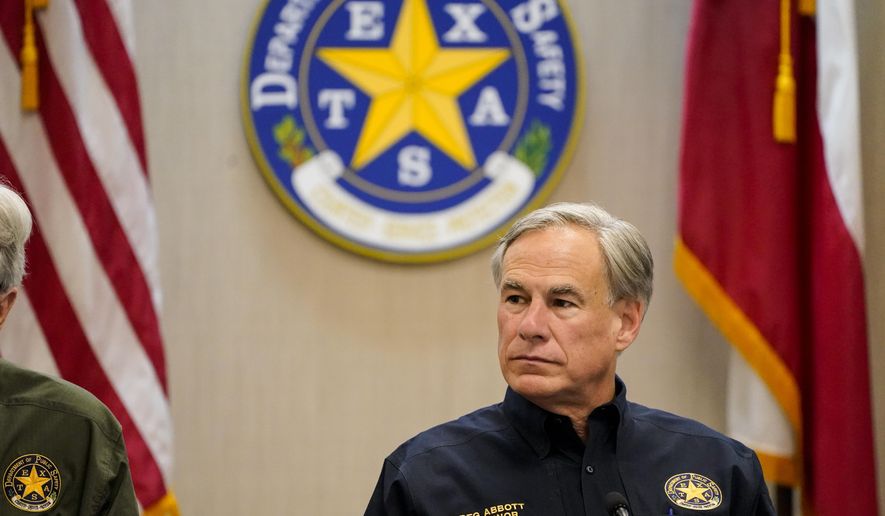Texas Gov. Greg Abbott attends a security briefing at the Weslaco Department of Public Safety DPS Headquarters on Wednesday, June 30, 2021 in Weslaco, Texas. Gov. Abbott says that he has tested negative for COVID-19, four days after testing positive. He said in a video clip he tweeted on Saturday, Aug. 21, 2021 that he&#39;s been told his infection was brief and mild because he was vaccinated. (Jabin Botsford/The Washington Post via AP, Pool)