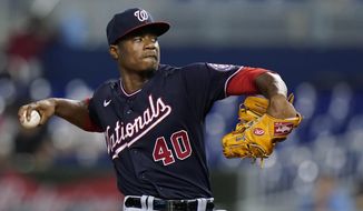 Washington Nationals&#39; Josiah Gray winds up during the first inning of the team&#39;s baseball game against the Miami Marlins, Wednesday, Aug. 25, 2021, in Miami. (AP Photo/Wilfredo Lee)