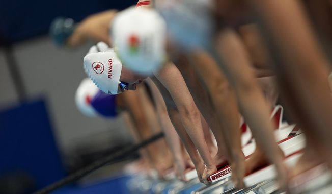 Participants compete at Women&#x27;s 50m Freestyle - S10 Heat 2 at the Tokyo Aquatics Centre during the Tokyo 2020 Paralympic Games, Wednesday, Aug. 25, 2021, in Tokyo, Japan. (AP Photo/Emilio Morenatti)