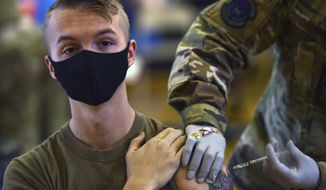 Hickam 15th Medical Group hosts the first COVID-19 mass vaccination on Joint Base Pearl Harbor-Hickam. (U.S. Air Force Tech. Sgt. Anthony Nelson Jr./Department of Defense via AP)