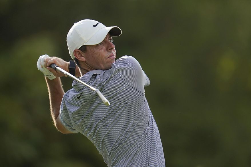 Rory McIlroy, of Northern Ireland, tees off on the 13th hole during the first round of the BMW Championship golf tournament, Thursday, Aug. 26, 2021, at Caves Valley Golf Club in Owings Mills, Md. (AP Photo/Julio Cortez)