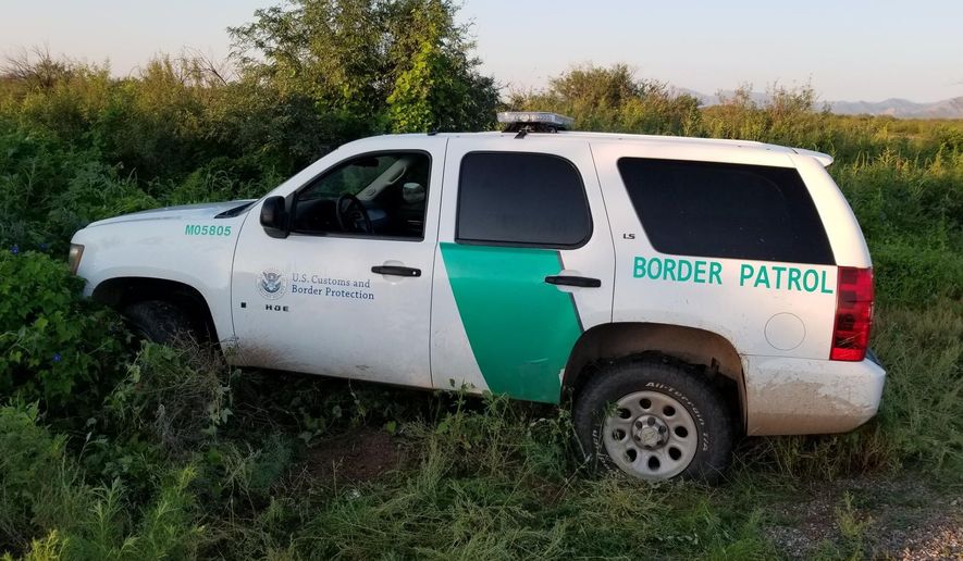 This photo, shared on Twitter by U.S. Border Patrol interim Chief John R. Modlin, shows a phony Border Patrol vehicle confiscated by federal agents. &quot;This is not a Border Patrol vehicle,&quot; Mr. Modlin tweeted on Tuesday, Aug. 24, 2021. &quot;@HSIPhoenix and #BorderPatrol agents from #Tucson Station foiled a smuggling attempt using a cloned vehicle and a fake uniform. The driver and 10 migrants were taken into custody.&quot;[https://twitter.com/USBPChiefTCA/status/1430241759800565771]