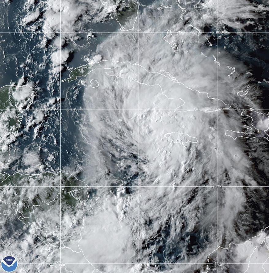 This OES-16 East GeoColor satellite image taken Thursday, Aug. 26, 2021, at 10:20 p.m. EDT, and provided by NOAA, shows Tropical Storm Ida in the Caribbean Sea. Tropical Storm Ida formed in the Caribbean on Thursday and forecasters said its track was aimed at the U.S. Gulf Coast, prompting Louisiana&#39;s governor to declare a state of emergency and forecasters to announce a hurricane watch for New Orleans. (NOAA via AP)