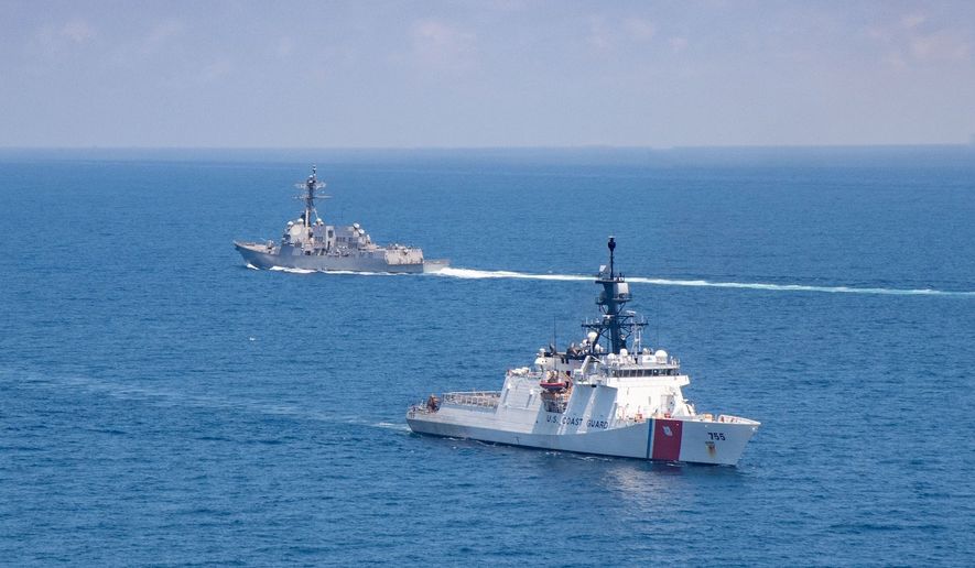 The USS Kidd and US Coast Guard cutter Munro are seen traversing the Taiwan Strait Friday, Aug. 27, 2021, in this U.S. Navy photo. (Photo credit: U.S. Navy)