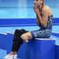 Jessica Long of the U.S. sits on the side of the pool after the Women&#39;s 100m Backstroke - S8 Final Swimming, at the Tokyo 2020 Paralympic Games in Tokyo Friday, Aug. 27, 2021. (Thomas Lovelock for OIS via AP)