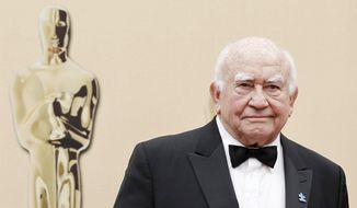 In this March 7, 2010, file photo, actor Ed Asner arrives during the 82nd Academy Awards in the Hollywood section of Los Angeles. Asner, the blustery but lovable Lou Grant in two successful television series, has died. He was 91. Asner&#39;s representative confirmed the death in an email Sunday, Aug. 29, 2021, to The Associated Press. (AP Photo/Matt Sayles, File)