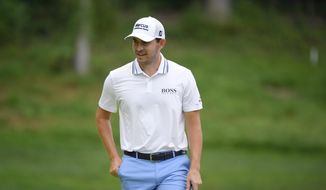 Patrick Cantlay reacts while approaching the eight green during the final round of the BMW Championship golf tournament, Sunday, Aug. 29, 2021, at Caves Valley Golf Club in Owings Mills, Md. (AP Photo/Nick Wass)