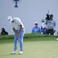 Bryson DeChambeau, right, watches as Patrick Cantlay putts on the 16th green during the final round of the BMW Championship golf tournament, Sunday, Aug. 29, 2021, at Caves Valley Golf Club in Owings Mills, Md. (AP Photo/Julio Cortez) **FILE**