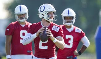 Indianapolis Colts quarterback Carson Wentz (2) throws during a drill during practice at the NFL team&#39;s football training camp in Westfield, Ind., Tuesday, Aug. 24, 2021. (AP Photo/Michael Conroy) **FILE**