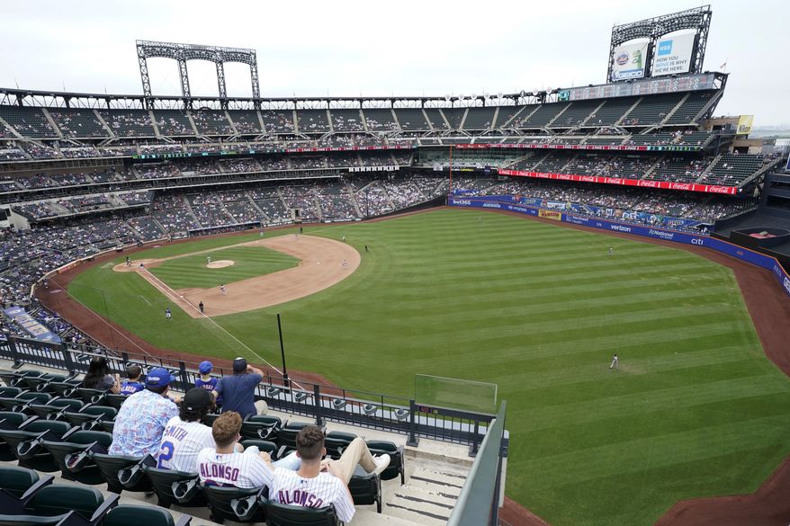 New York Mets fans watch a baseball game against the Washington Nationals during the seventh inning, Sunday, Aug. 29, 2021, in New York. (AP Photo/Corey Sipkin) **FILE**