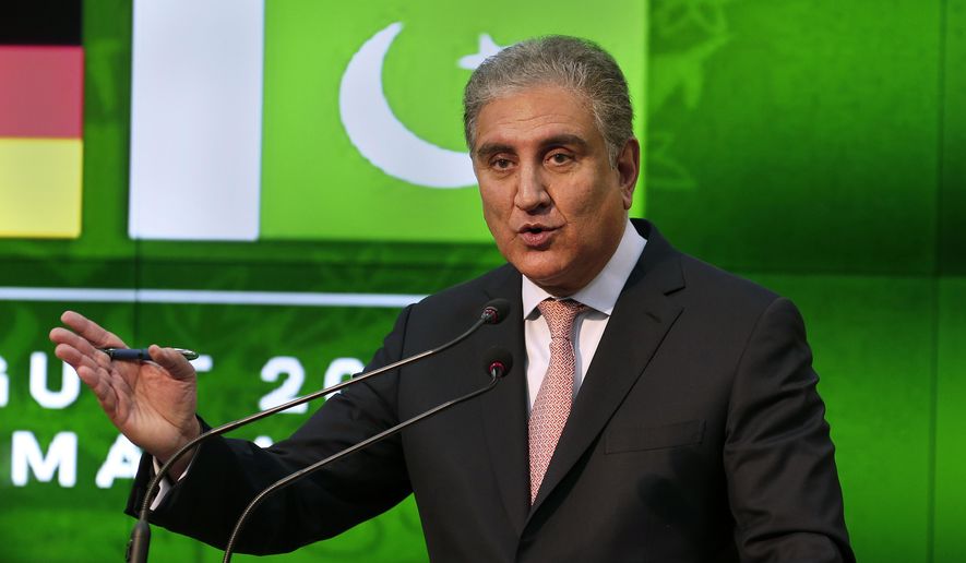 Pakistani Foreign Minister Shah Mahmood Qureshi speaks during a press conference with his German counterpart Heiko Maas after their meeting in Islamabad, Pakistan, Tuesday, August 31, 2021. Maas arrived in Islamabad on two-day visit to hold talks with Pakistani leadership to discuss bilateral matters, international issues and the current situation in Afghanistan. (AP Photo/Anjum Naveed)