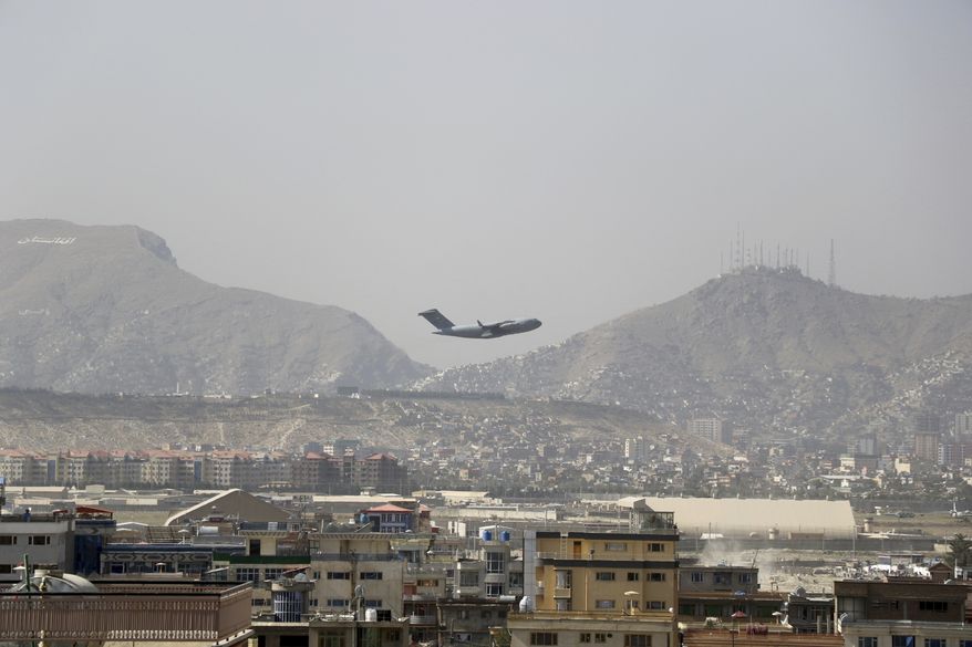 U.S military aircraft takes off at the Hamid Karzai International Airport in Kabul, Afghanistan, Saturday, Aug. 28, 2021.(AP Photo/Wali Sabawoon) ** FILE **