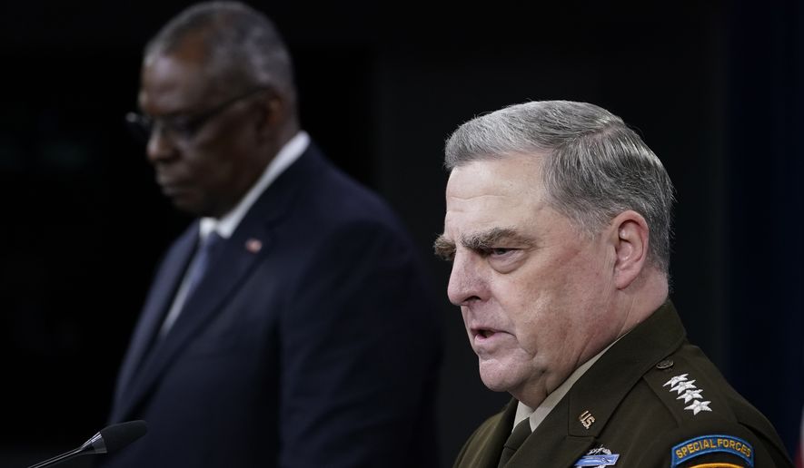 Joint Chiefs of Staff Gen. Mark Milley, right, answers a question during a briefing with Secretary of Defense Lloyd Austin, left, at the Pentagon in Washington, Wednesday, Sept. 1, 2021, about the end of the war in Afghanistan. (AP Photo/Susan Walsh)  **FILE**
