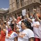 In this Sept. 1, 2021 file photo, women protest against the six-week abortion ban at the Capitol in Austin, Texas. Even before a strict abortion ban took effect in Texas this week, clinics in neighboring states were fielding more and more calls from women desperate for options. The Texas law, allowed to stand in a decision Thursday, Sept. 2, 2021 by the U.S. Supreme Court, bans abortions after a fetal heartbeat can be detected, typically around six weeks. (Jay Janner/Austin American-Statesman via AP File) **FILE**