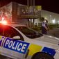 Police stand outside the site of a knife attack at a supermarket in Auckland, New Zealand, Friday, Sept. 3, 2021. New Zealand authorities say they shot and killed a violent extremist after he entered the supermarket and stabbed and injured six shoppers. New Zealand Prime Minister Jacinda Ardern described Friday&#x27;s incident as a terror attack. (AP Photo/Brett Phibbs)