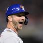 New York Mets&#x27; Pete Alonso reacts at third after he hit an RBI triple during the third inning of the team&#x27;s baseball game against the Washington Nationals, Friday, Sept. 3, 2021, in Washington. (AP Photo/Nick Wass)