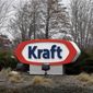 This Wednesday, March 25, 2015, file photo shows the Kraft logo outside of the company&#39;s headquarters in Northfield, Ill.   Kraft Heinz Co. is agreeing to pay $62 million to settle charges of improper accounting of what it once claimed were cost savings. Two former senior executives have agreed to pay civil penalties. The Securities and Exchange Commission said Friday, Sept. 3, 2021,  that from late 2015 through 2018, Kraft boasted about cost savings that were actually unearned discounts and gave false reports about contracts with suppliers.   (AP Photo/Nam Y. Huh, File)
