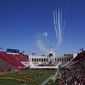 Airplanes fly over Los Angeles Memorial Coliseum before an NCAA college football game between San Jose State and Southern California Saturday, Sept. 4, 2021, in Los Angeles. (AP Photo/Ashley Landis) **FILE**