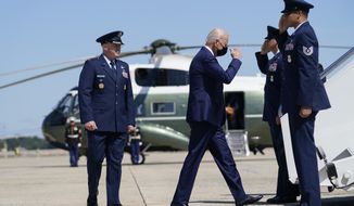 President Joe Biden returns a salute as he walks to board Air Force One to travel to Louisiana to view damage caused by Hurricane Ida, Friday, Sept. 3, 2021, in Andrews Air Force Base, Md. (AP Photo/Evan Vucci)