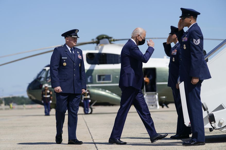 President Joe Biden returns a salute as he walks to board Air Force One to travel to Louisiana to view damage caused by Hurricane Ida, Friday, Sept. 3, 2021, in Andrews Air Force Base, Md. (AP Photo/Evan Vucci)