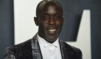In this Sunday, Feb. 9, 2020, photo, Michael K. Williams arrives at the Vanity Fair Oscar Party in Beverly Hills, Calif. Williams, who played the beloved character Omar Little on The Wire, has died. New York City police say Williams was found dead Monday, Sept. 6, 2021, at his apartment in Brooklyn. He was 54. (Photo by Evan Agostini/Invision/AP) **FILE**