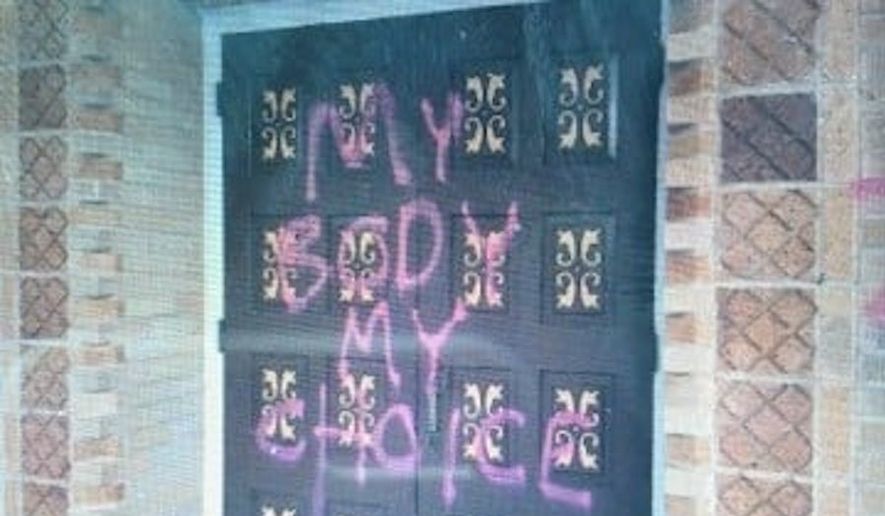 Louisville police in Colorado said St. Louis Catholic Church was defaced on Sunday, Sept. 5, 2021. (Image: Courtesy of the Louisville Police Department via Facebook) ** FILE **