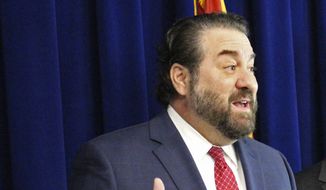 In this Jan. 7, 2020, photo, Arizona Attorney General Mark Brnovich speaks at a news conference in Phoenix. (AP Photo/Bob Christie) ** FILE **