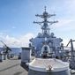 The Arleigh Burke-class guided-missile destroyer USS Benfold (DDG 65) sails through the South China Sea while conducting routine underway operations. Benfold is forward-deployed to the U.S. 7th Fleet area of operations in support of a free and open Indo-Pacific. (U.S. Navy photo by Mass Communication Specialist 1st Class Deanna C. Gonzales) **FILE**