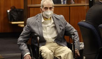 Robert Durst in his wheelchair spins in place as he looks at people in the courtroom as he appears in a courtroom in Inglewood, Calif. on Wednesday, Sept. 8, 2021, with his attorneys for closing arguments presented by the prosecution in the murder trial of the New York real estate scion who is charged with the longtime friend Susan Berman&#39;s killing in Benedict Canyon just before Christmas Eve 2000. (Al Seib/Los Angeles Times via AP, Pool)