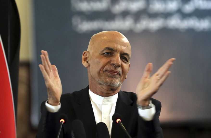 In this March 21, 2021 file photo, Afghan President Ashraf Ghani speaks during a ceremony celebrating the Persian New Year, Nowruz at the presidential palace in Kabul, Afghanistan. Afghanistan’s embattled president left the country Sunday, Aug. 15, 2021, joining his fellow citizens and foreigners in a stampede fleeing the advancing Taliban and signaling the end of a 20-year Western experiment aimed at remaking Afghanistan. (AP Photo/Rahmat Gul, File)