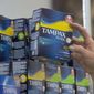 In this June 22, 2016, photo, Tammy Compton restocks tampons at Compton&#39;s Market in Sacramento, Calif. (AP Photo/Rich Pedroncelli) **FILE**