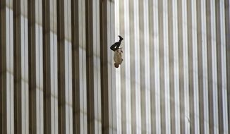 A person falls from the north tower of New York&#39;s World Trade Center Tuesday, Sept. 11, 2001, after terrorists crashed two hijacked airliners into the World Trade Center and brought down the twin 110-story towers. Associated Press photographer Richard Drew talks about AP’s coverage of 9/11 and the events that followed. (AP Photo/Richard Drew) ** FILE **